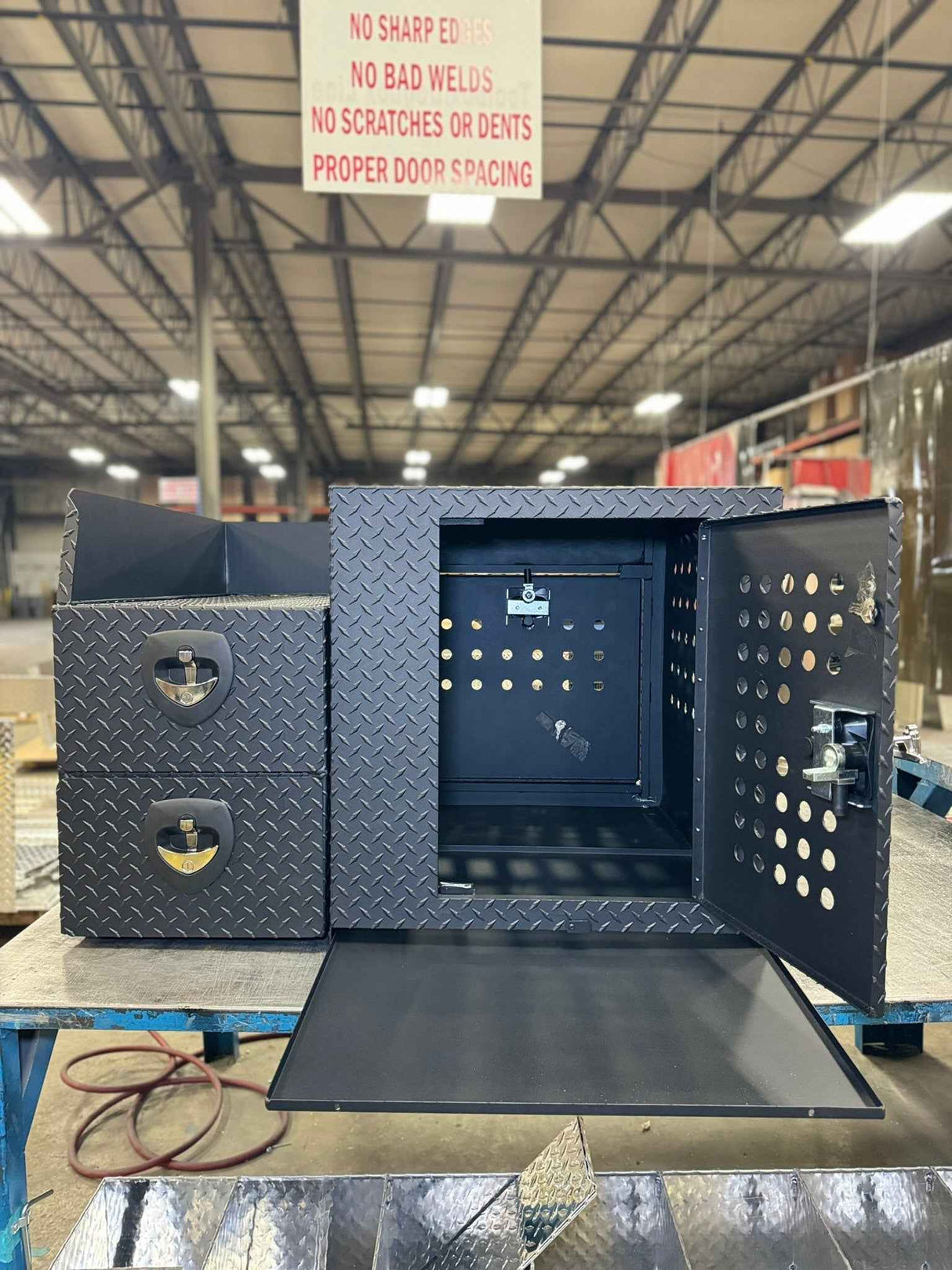 Dog Crate 55500 Professional K9 Series Rear Deployment Unit / Single Compartment / Side Drawer Storage / 45 W X 38 D X 31 H / Holes for Ventilation / Black / Diamond Tread Aluminum / Owens Products Professional K9 Series Owens Products