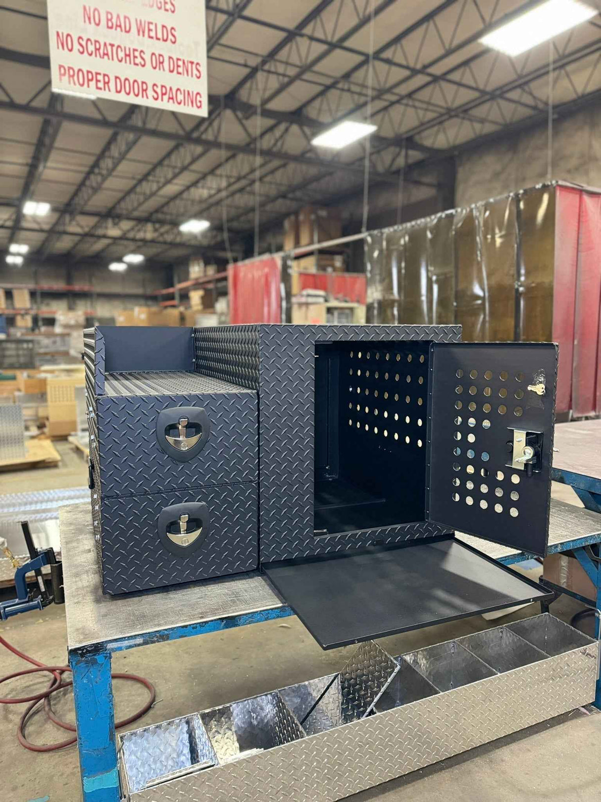 Dog Crate 55500 Professional K9 Series Rear Deployment Unit / Single Compartment / Side Drawer Storage / 45 W X 38 D X 31 H / Holes for Ventilation / Black / Diamond Tread Aluminum / Owens Products Professional K9 Series Owens Products