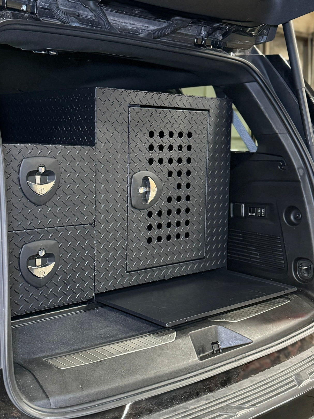 Dog Crate 55500 Professional K9 Series Rear Deployment Unit / Single Compartment / Side Drawer Storage / 45 W X 38 D X 31 H / Holes for Ventilation / Black / Diamond Tread Aluminum/ Owens Products